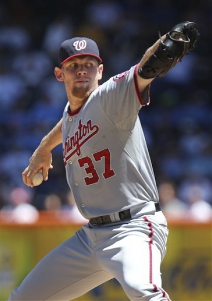 Lat strain forces Strasburg to disabled list