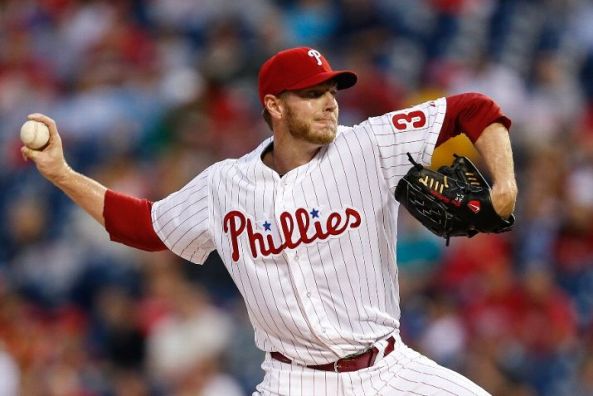 Offense breaks free to back Halladay's strong outing