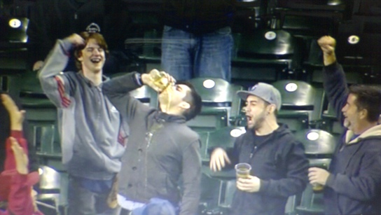 Fan catches foul ball in beer then chugs it (Video)