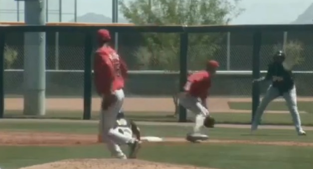 First base coach takes errant pick-off throw to the groin (Video)
