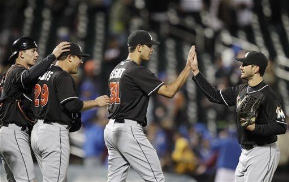 Marlins get manager Mike Redmond his first win