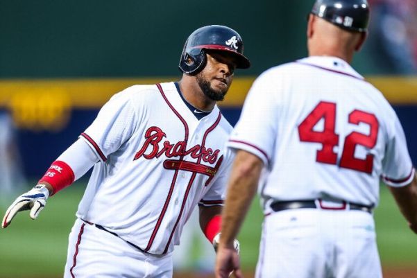 Braves win 10th straight behind 3 homers in 8th  