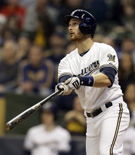 Brewers capitalize on errors to give Burgos first win
