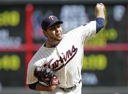 Hernandez earns first win as Twins rout Rangers