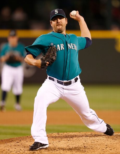Mariners roll past O's behind double Saunders act
