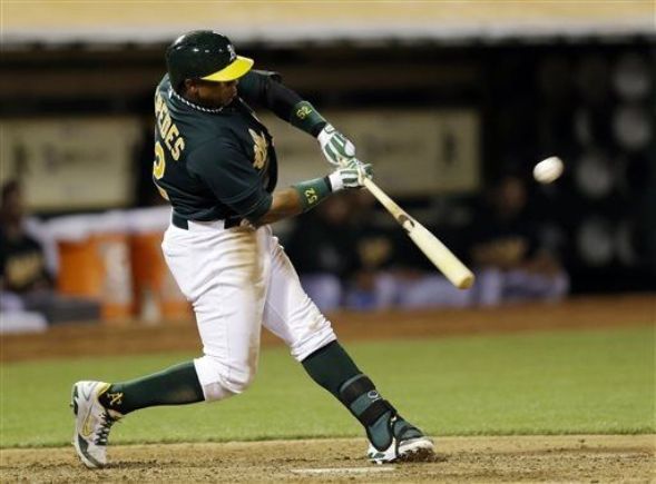 Cespedes drives in 4 runs, A’s beat Angels 10-6