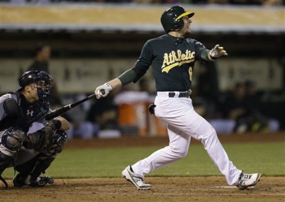 Lowrie powers A's past Mariners 6-2