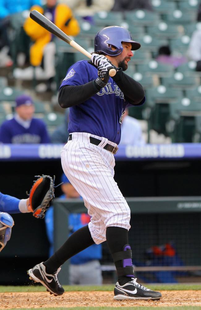 Helton, CarGo lead Rockies to win in Game 1