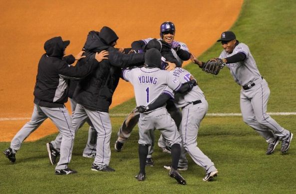 Rockies rally, win in 10th to sweep DH from Mets