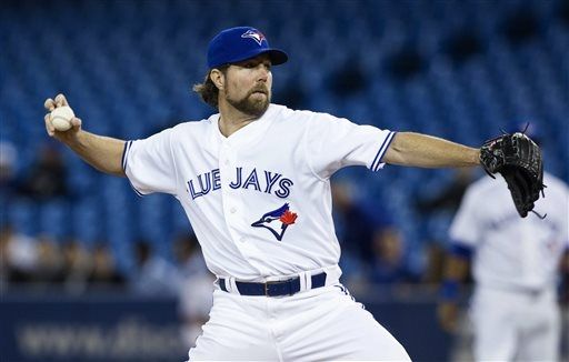 Dickey earns second win, but exits early