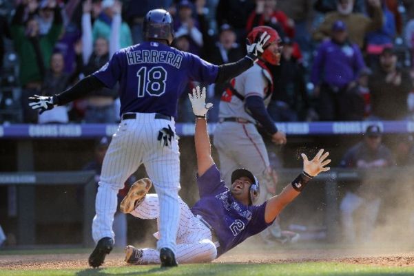  Torrealba's hit wins it in 12th for Rockies  