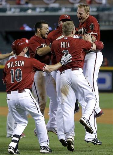 Pennington lifts D'backs over Cards in 16 innings