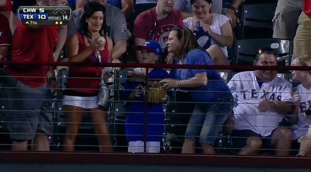 Woman steals home run ball from little boy then throws it back!