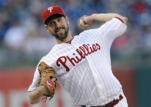 Lee, Rollins lead Phillies over Reds