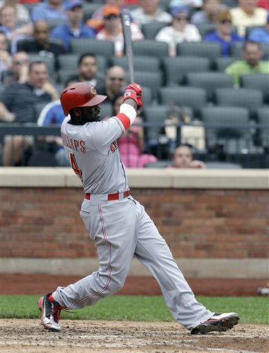 Phillips’ strange double lifts Reds over Mets 7-4