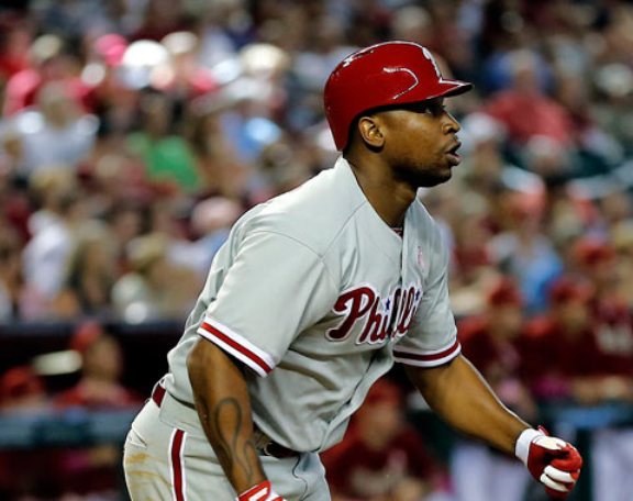 Delmon delivers in eighth as Phils top Nats 5-3