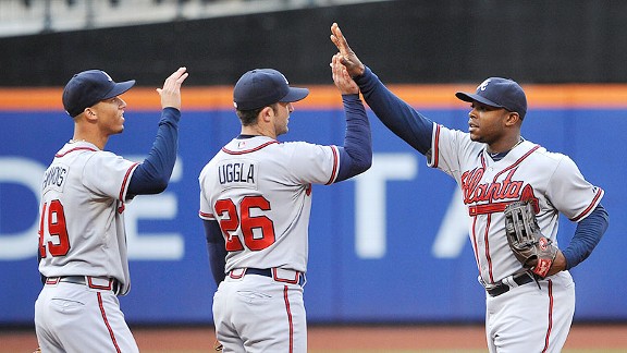 Braves claim suspended game, win seventh straight