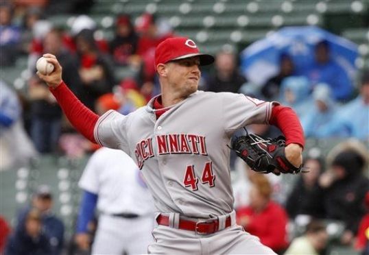 Reds break out of offensive funk, survive late rally