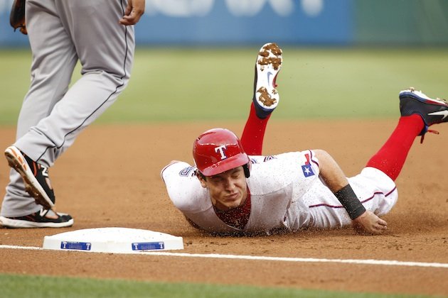 Ian Kinsler with a faceplant on his head-first slide 
