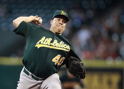 Colon leads A's to 11th straight win over Astros  