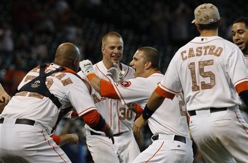 Astros outlast Rockies for 3-2 win in 12 innings