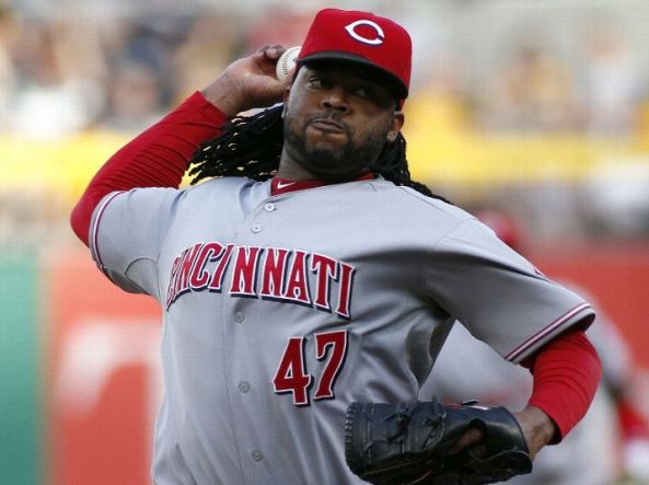 Reds roll in opener vs. Pirates behind dominant Cueto