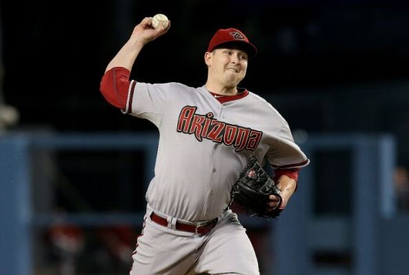 Cahill's solid outing lifts D-backs past slumping LA