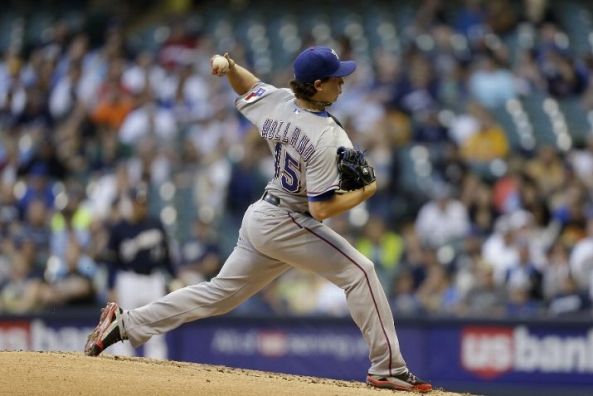 Holland's sharp outing helps Rangers limit slide