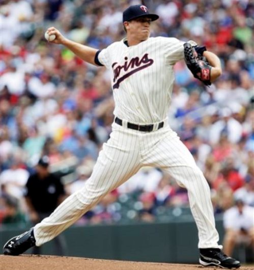 Gibson wins debut as Twins beat Royals 6-2