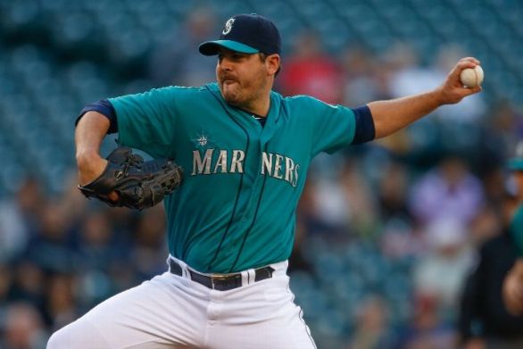 Saunders cruises as Mariners take opener from White Sox