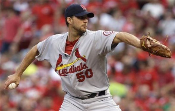 Wainright, Cards cruise past Reds, pad Central lead