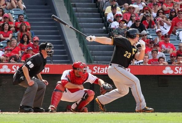 Pirates rally with 7 late runs, top Angels 10-9 in 10 innings