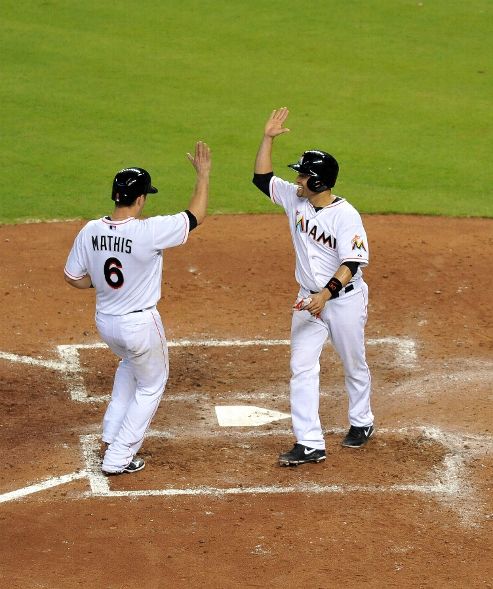 Marlins rally past Twins 5-3 for winning June