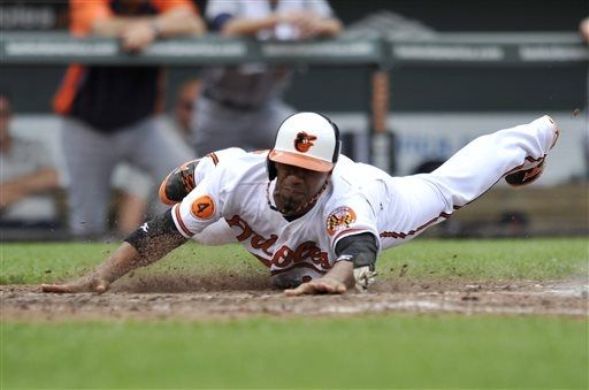 Davis hits 20th homer as Orioles rally past Tigers