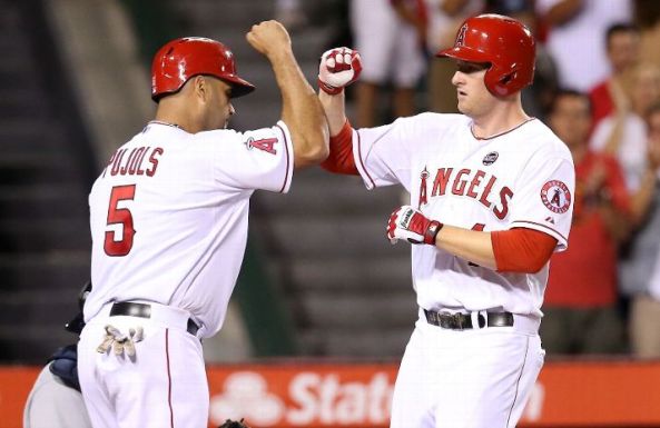 Angels rally from 7 runs down, stun Seattle 10-9