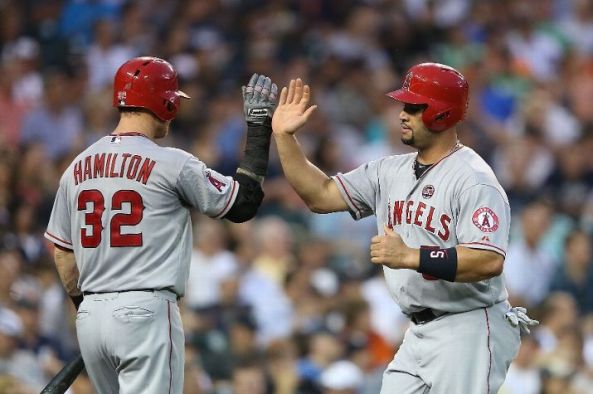 Angels rout error-prone Tigers 14-8