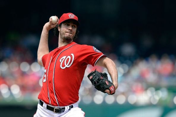 Three blasts help Haren to first win since May