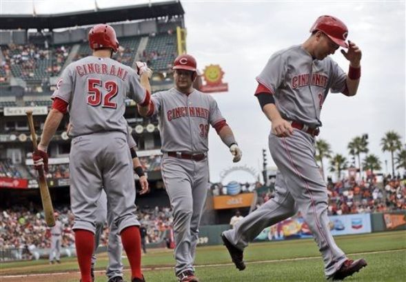 Reds come out swinging to pound Giants again 9-3