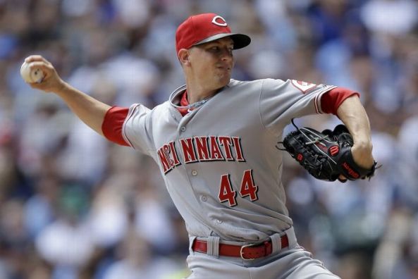 Leake leads Reds to 6-2 win over Brewers