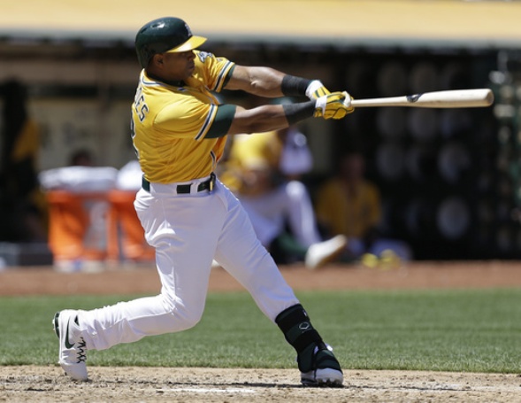 Cespedes helps A's rally to beat Angels 10-6  