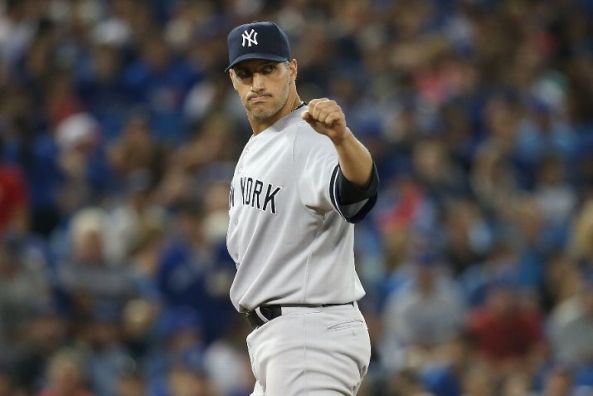 Andy Pettitte's incredible catch on a comebacker vs Blue Jays (Video)