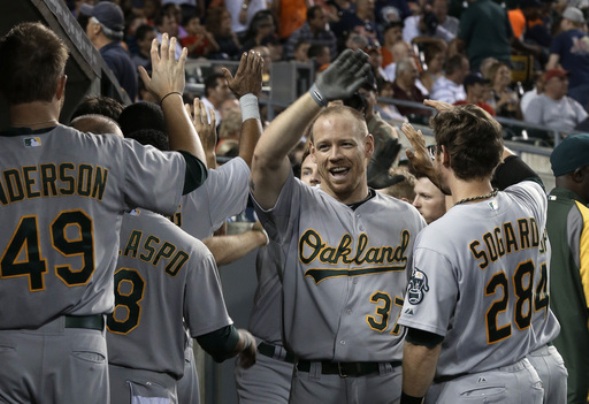 Moss has 2 HRs, 6 RBIs to lead A's to 14-4 win