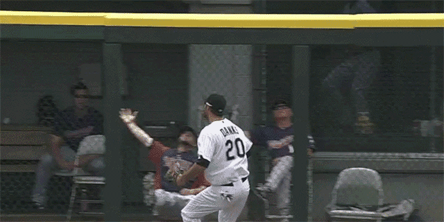 Twins reliever Jared Burton throws a fake punch at Brian Duensing as home run lands in bullpen(GIF)