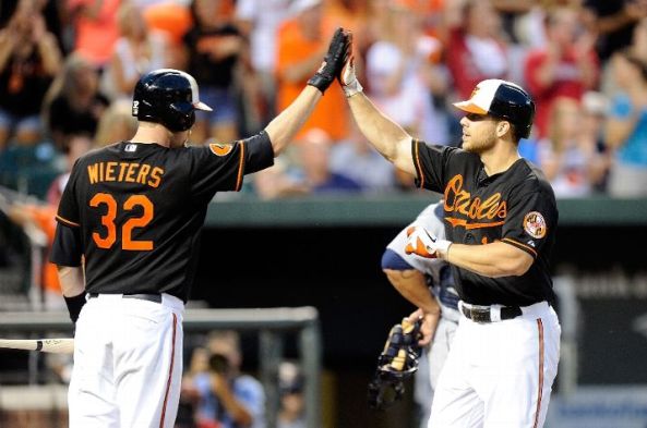 Davis hits 40th HR as Orioles beat Mariners 11-8