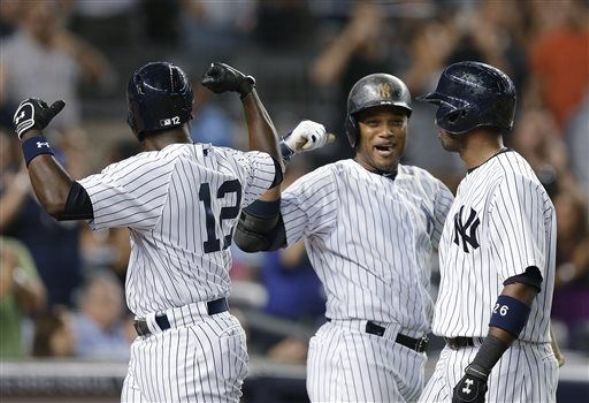 Soriano homers twice, Yanks offense breaks out in 14-7 rout