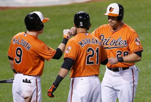 Orioles use 7-run 3rd to beat Rockies 8-4