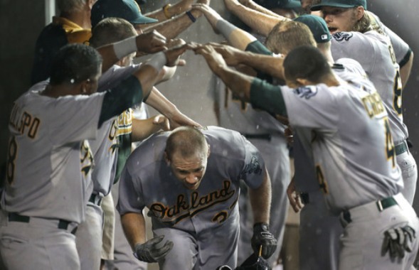 A's get rain-shortened 6-3 win over Tigers