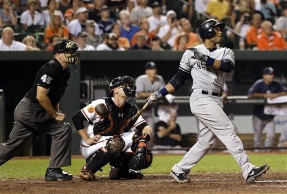 Cano's homer leads Yanks pass O's, Tribe in wild-card hunt