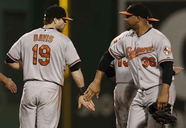 Davis' hit lifts O's past Red Sox 5-3 in 12