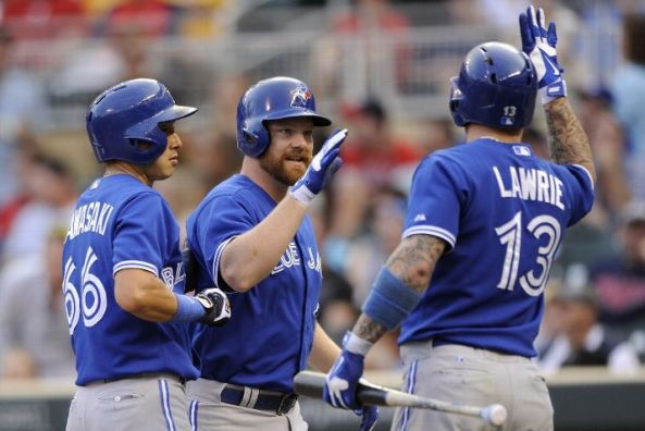 Lind homers twice, drives in 6 as Jays rout Twins 11-2